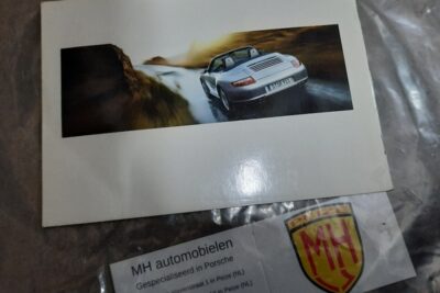 Porsche 997 wit assistanceboekje