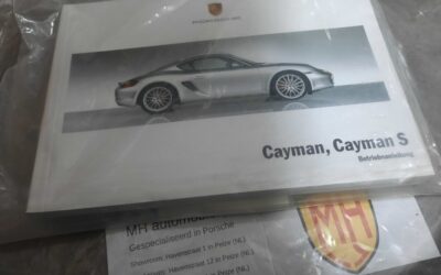 Porsche Cayman wit instruktieboekje