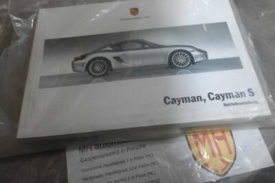 Porsche Cayman wit instruktieboekje